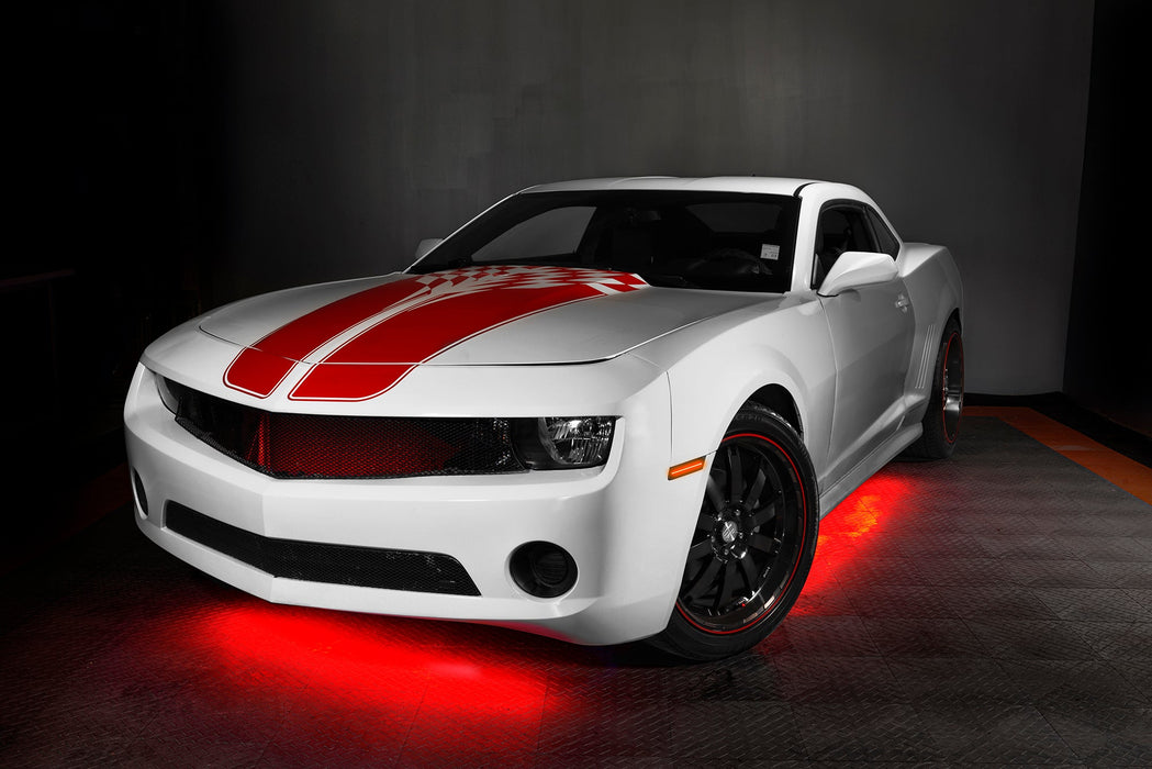 White camaro with red LED underglow.