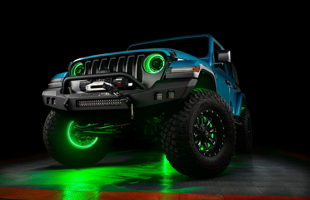 Aqua jeep with green LED halos and wheel rings.