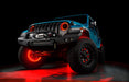 Aqua jeep with red LED halos and wheel rings.