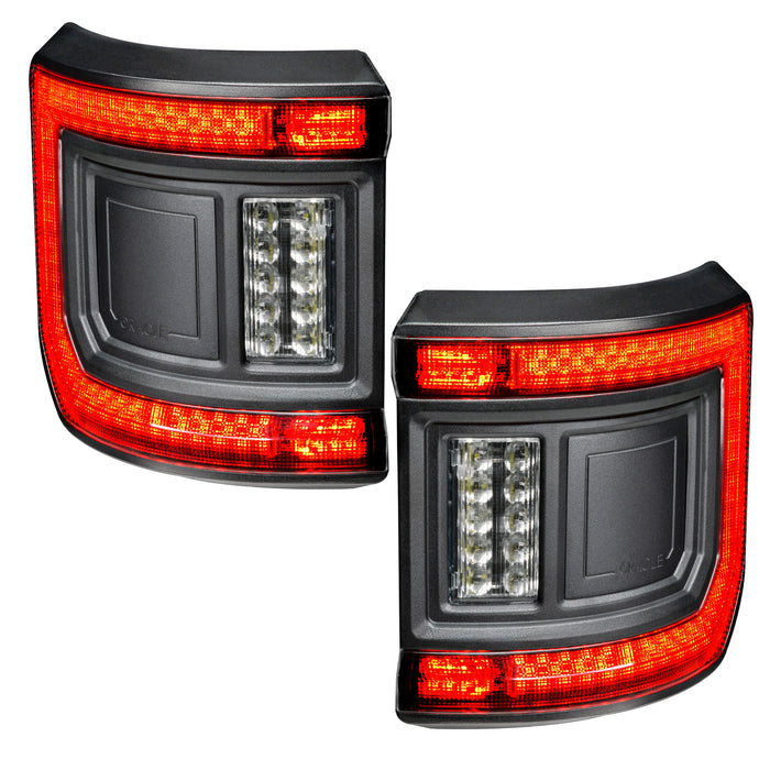 Front view of Tinted Flush Mount LED Tail Lights for Jeep Gladiator JT with running lights on.