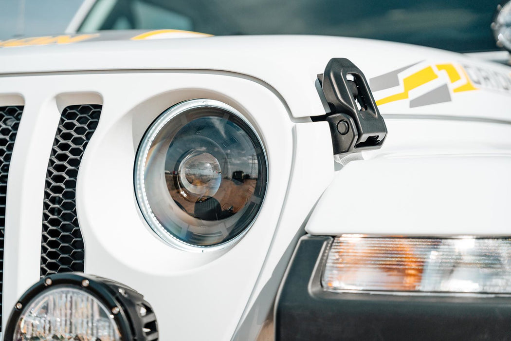 Extreme close-up of an Oculus Headlight installed on a Jeep.