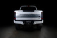Straight rear view of a white Ford Superduty with Flush Mount Tail Lights installed.