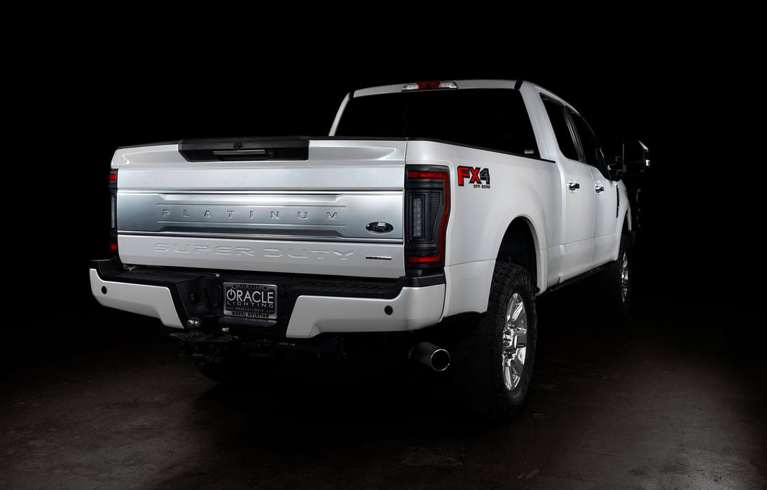 Rear three quarters view of a white Ford Superduty with Flush Mount Tail Lights installed.