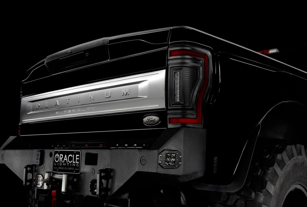 Close up on the rear end of a black Ford Superduty, with Flush Mount Tail Lights installed.