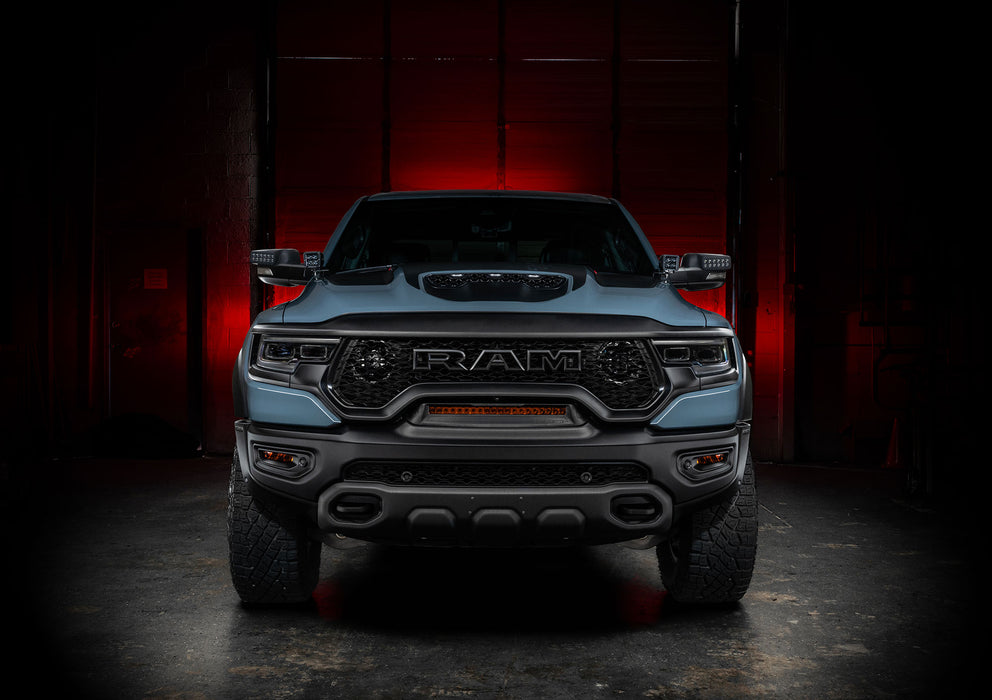 Straight front view of a RAM TRX with LED Off-Road Side Mirror Ditch Lights installed
