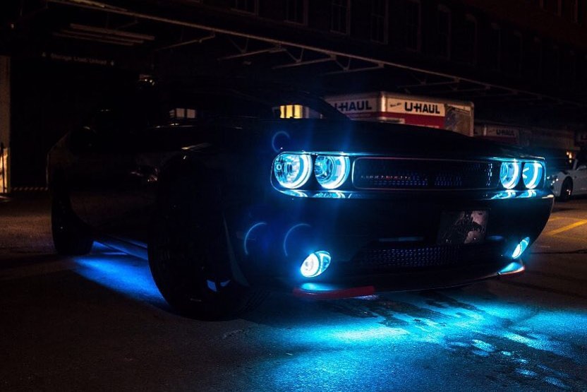Black Charger with white halos and white LED underbody kit installed.
