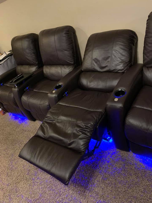 Recliners with LED lighting underneath.