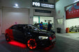 Black Audi with red LED illuminated wheel rings.