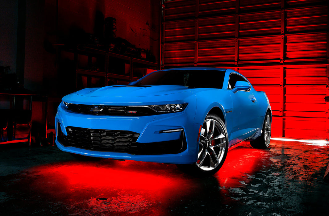 Blue Camaro with red LED underglow.