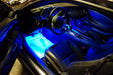 Camaro interior with blue LED footwell lighting.