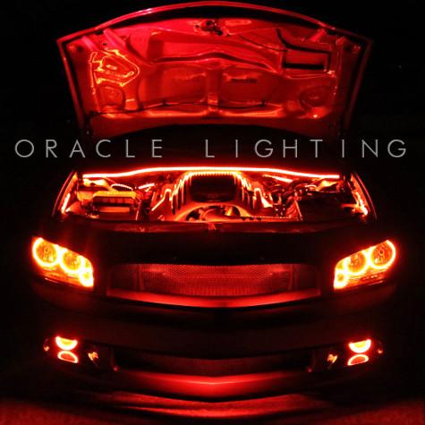 Car in the dark with red LED lighting.