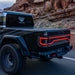 Jeep Gladiator JT driving down a desert highway with Flush Mount Tail Lights installed.