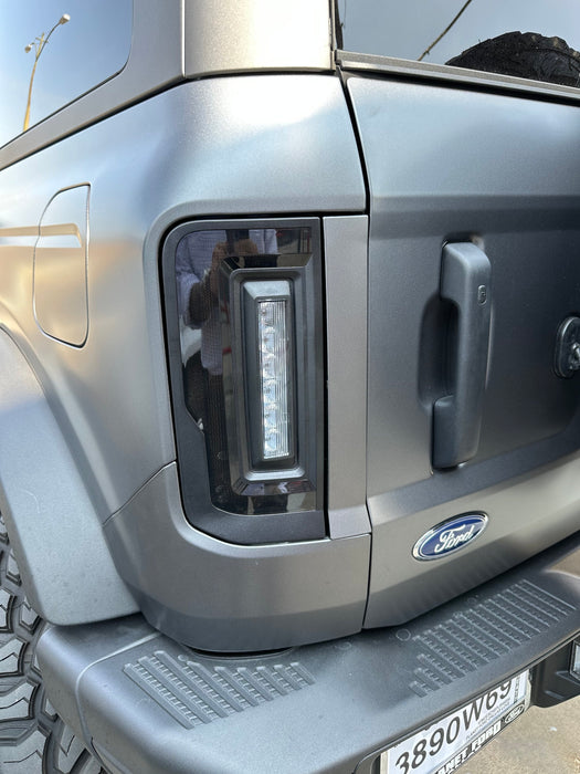 Close-up of Tinted Flush Style LED Tail Lights installed on a silver Ford Bronco.