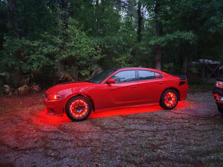 Red Dodge Charger with red LED underbody kit and red halos.