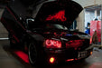 Black charger with red LED lighting.
