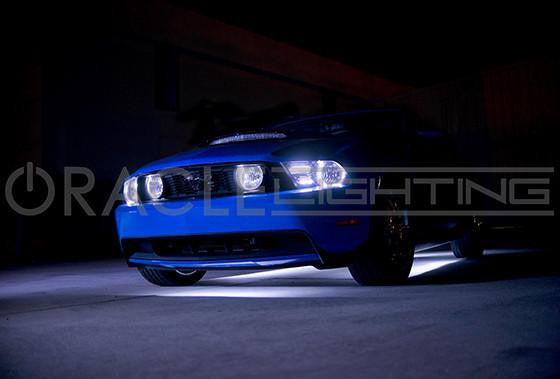 A Blue Mustang with white LED underbody kit.