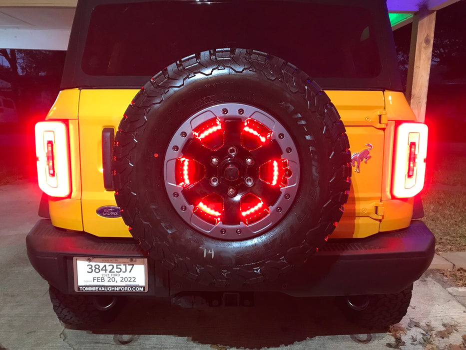Close-up of LED Spare Tire Wheel Ring Third Brake Light installed on Ford Bronco.