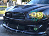 Front end of a black Dodge Charger with yellow LED headlight rings installed.