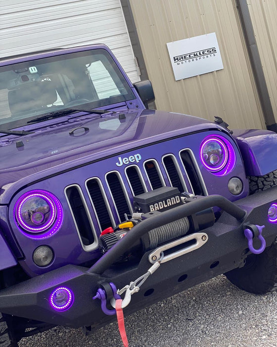 Front end of a Jeep Wrangler with 7" High Powered LED Headlights installed.