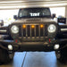 Front end of a Jeep Gladiator JT with amber Pre-Runner Style LED Grill Light Kit installed.