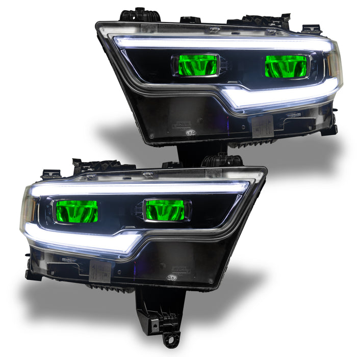 Ram 1500 headlights with green demon eye projectors.