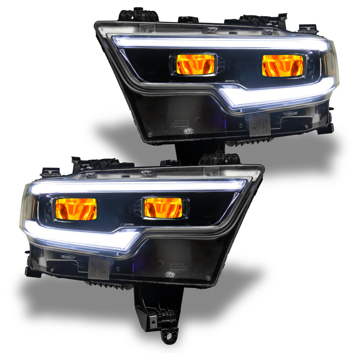 Ram 1500 headlights with amber demon eye projectors.