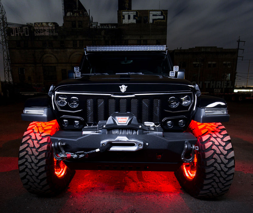 Front view of a Jeep Wrangler with Black Series - 7D 3" 20W LED Square Spot/Flood Lights installed on the dashboard.