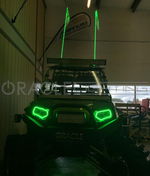 Front view of a Polaris with two Off-Road 6ft ColorSHIFT LED Whips installed on the roof.
