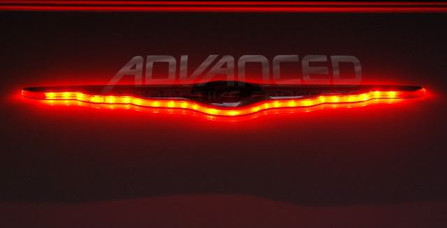 Gen I Chrysler Illuminated LED Rear Wing Emblem with red LEDs.