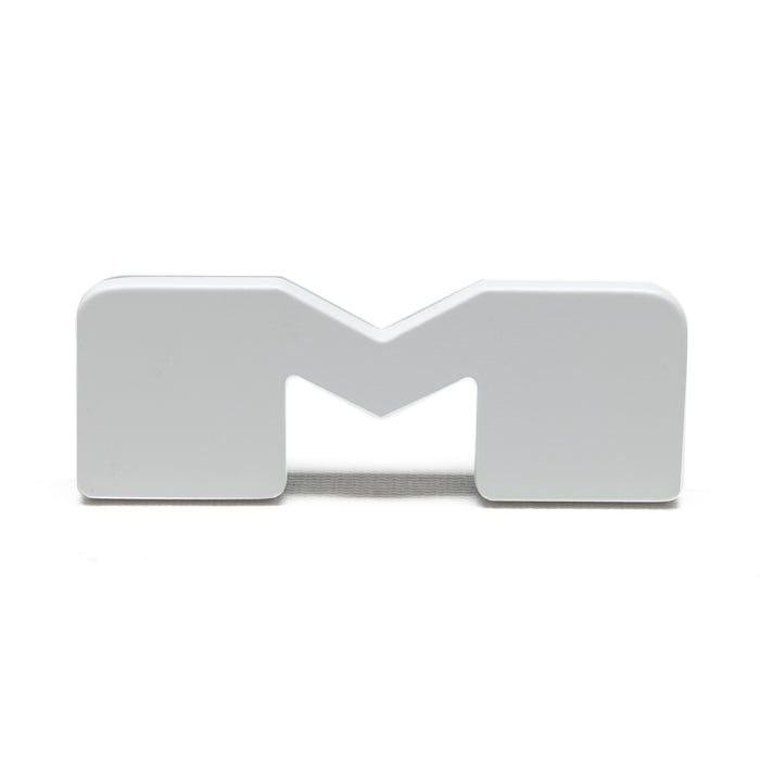 The letter "M" Illuminated Letter Badge with matte white finish.