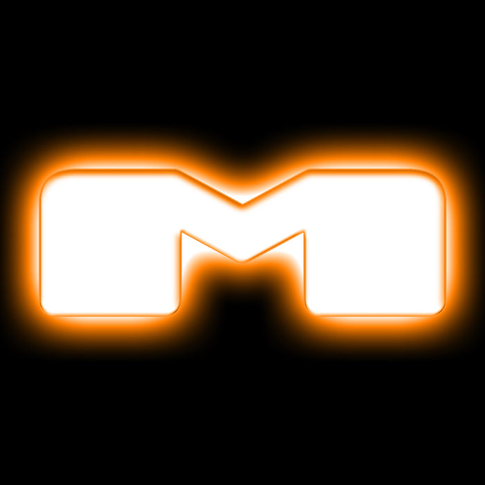 The letter "M" Amber LED Illuminated Letter Badge with matte white finish.