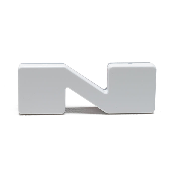 The letter "N" Illuminated Letter Badge with matte white finish.