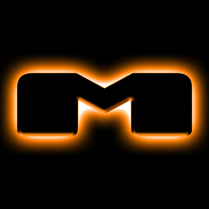 The letter "M" Amber LED Illuminated Letter Badge with matte black finish.
