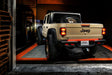 Rear view of Jeep Gladiator JT with 60” Double Row LED Truck Tailgate Light Bar installed.