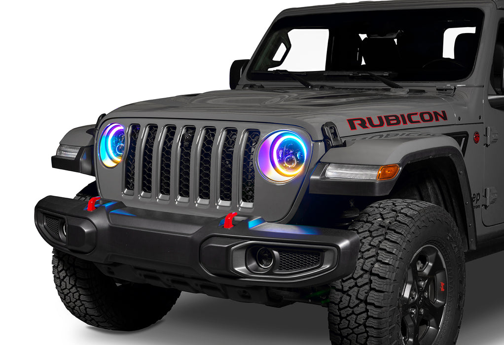 Front end of a Jeep Wrangler with Dynamic ColorSHIFT 7" High Powered LED Headlights installed.