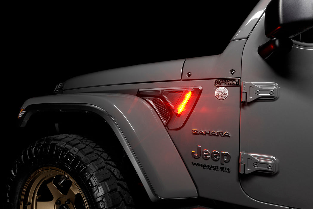 Close-up of Sidetrack™ LED Lighting System installed on a Jeep, and set to amber LED mode.