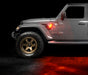 Side view of a Jeep with Sidetrack™ LED Lighting System installed, and set to amber LED mode.