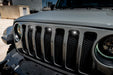Front end of a Jeep Wrangler JL with Pre-Runner Style LED Grill Light Kit installed, set to white LEDs.