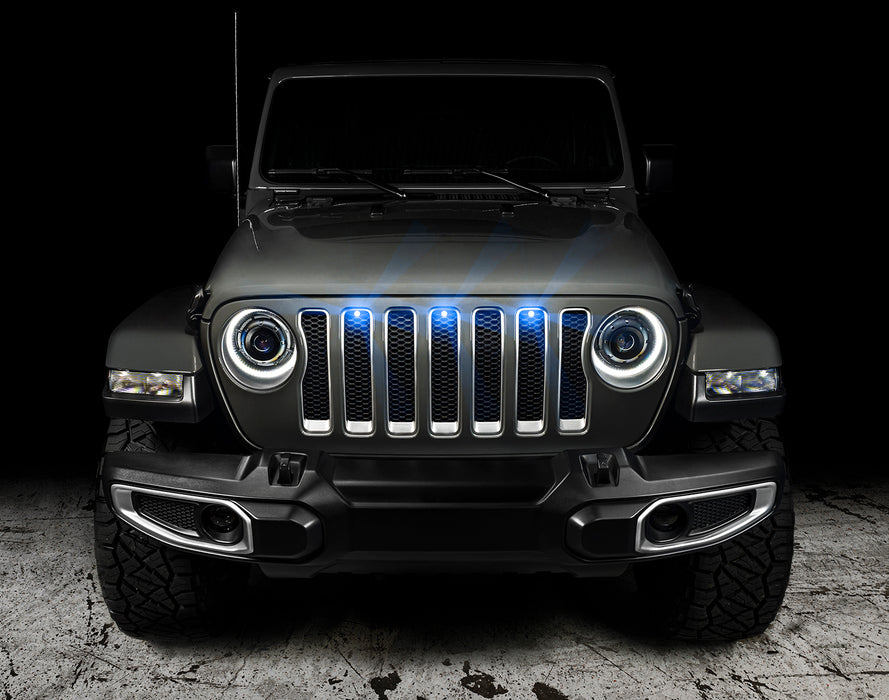 Front end of a Jeep Wrangler JL with cyan Pre-Runner Style LED Grill Light Kit installed.