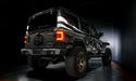 Rear three quarters view of a Jeep Wrangler JL with Flush Mount LED Tail Lights installed and brake lights on.