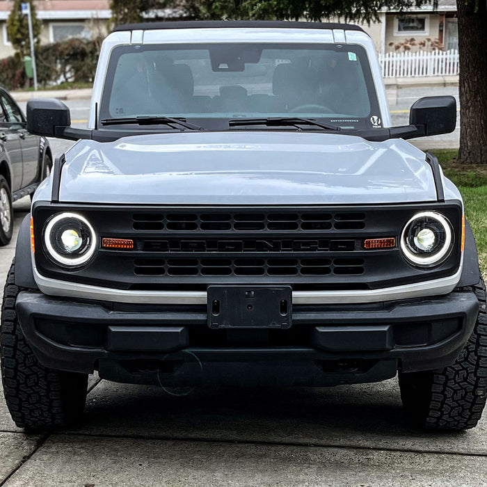 Front view of a white Ford Bronco with Oculus Headlights installed.