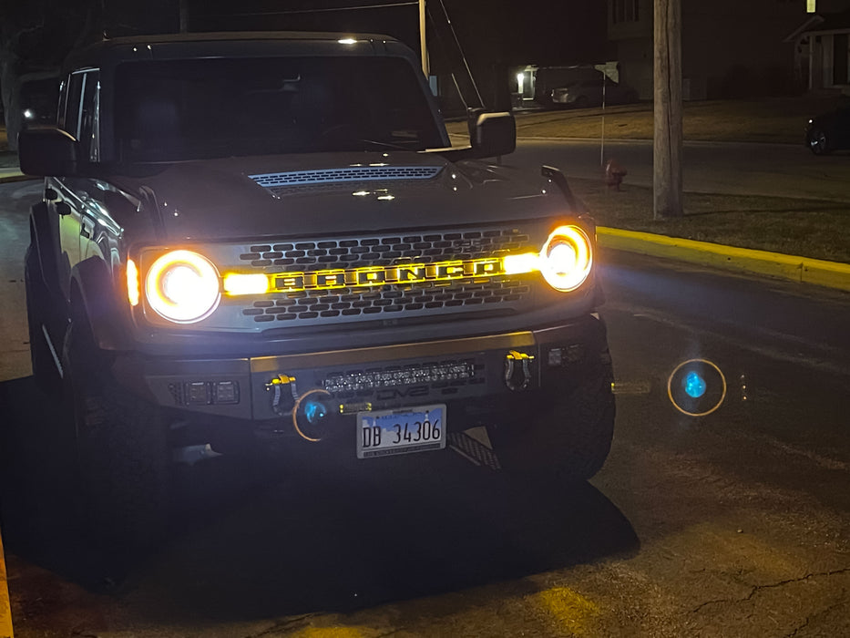 Grey Ford Bronco with Oculus Headlights installed.