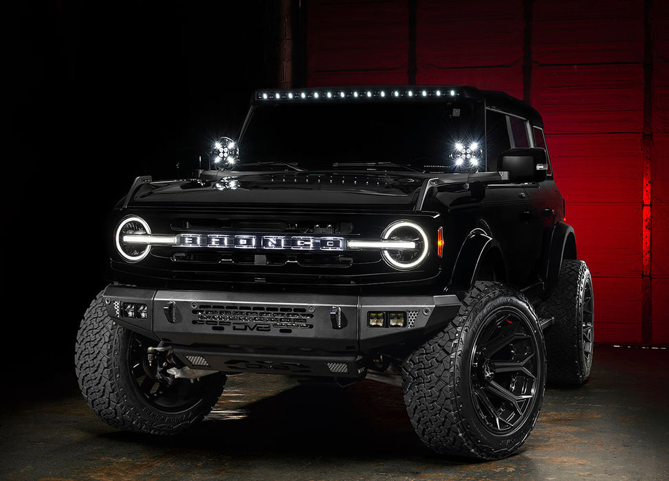 Studio shot of a black Ford Bronco equipped with the Integrated Windshield Roof LED Light Bar System.