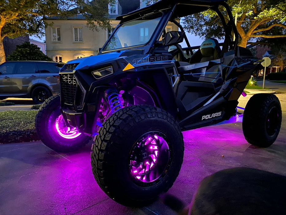 Polaris RZR with purple LED wheel rings.