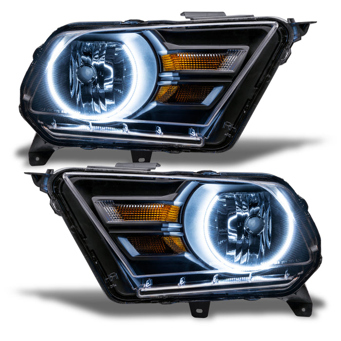 Ford Mustang headlights with white LED halo rings.