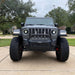 Front end of a Jeep Wrangler equipped with Oculus Headlights.