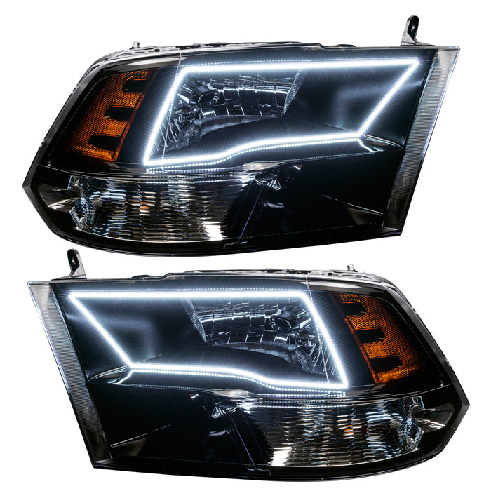 2009-2018 RAM ColorSHIFT Switchback Quad Pre-Assembled Halo Headlights - Black Housing with white halos.
