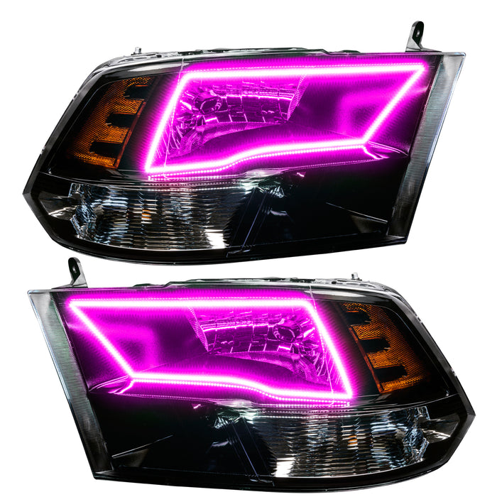 2009-2018 RAM ColorSHIFT Switchback Quad Pre-Assembled Halo Headlights - Black Housing with pink halos.