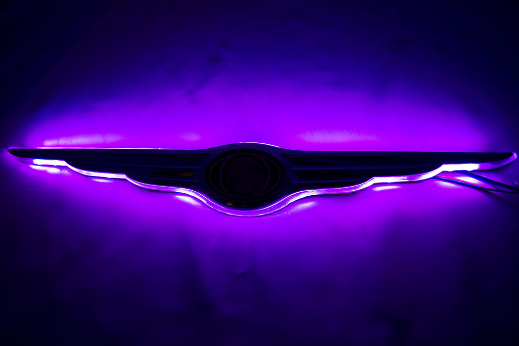 Gen I Chrysler Illuminated LED Rear Wing Emblem with purple LEDs.