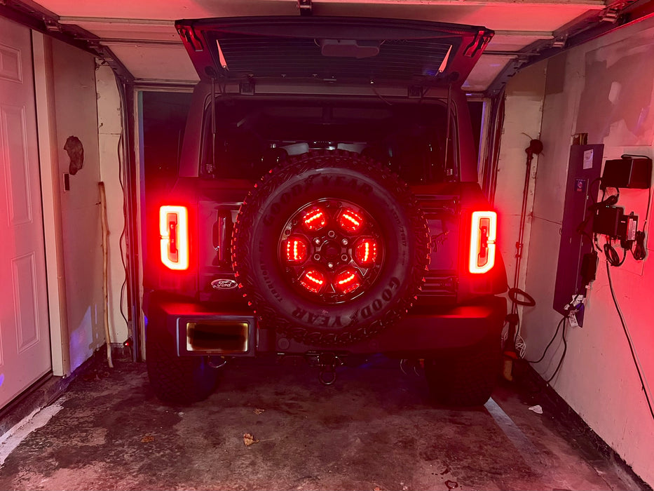 Ford Bronco in a garage with Spare Tire Wheel Ring Third Brake Light installed.